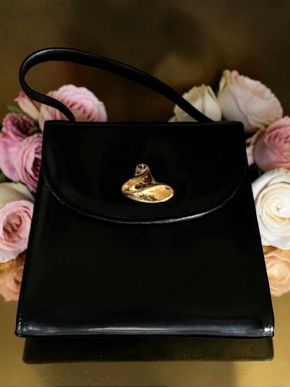 Classic Black Leather Top-Handle Bag with Gold Accent